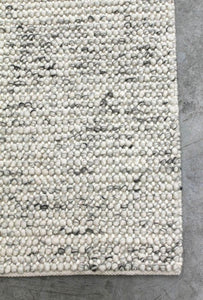 Magic Ice Wool Rug Handmade. Textured loops of wool knotted into a backing. Rug Addiction stockist of The Rug Collection Australia.