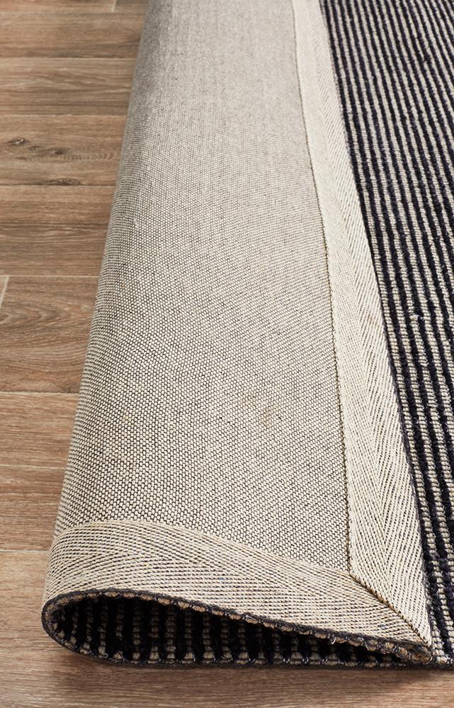 Allure Black Flat Woven Rug by Rug Addiction. 