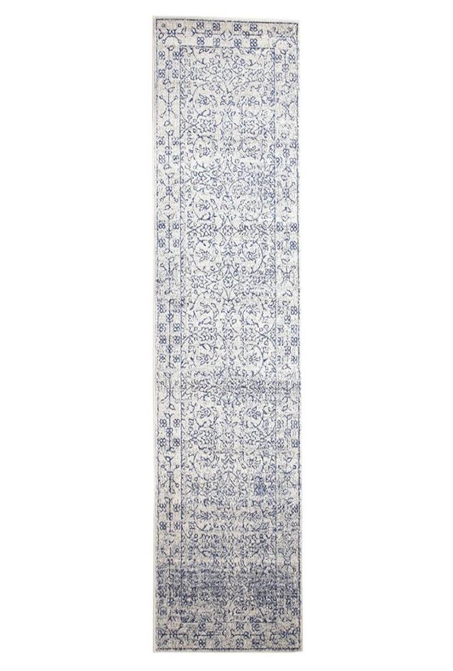 Evoke 258 White Rug with blue and grey highlights. Synthetic Machine Made Rug and Hall Runner comes in Extra Large Sizes