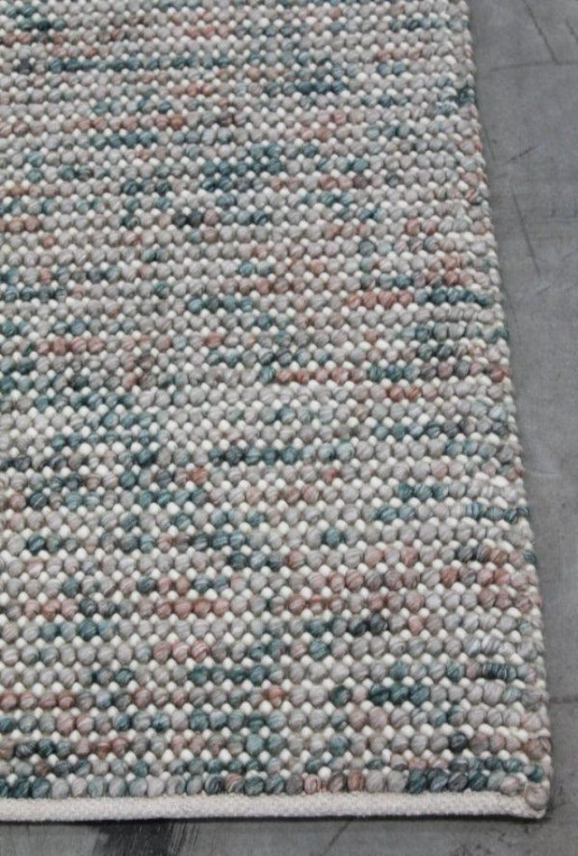 Magic Oasis Wool Handmade rug with knotted loops of wool, textured and pastel coloured in the latest colours.